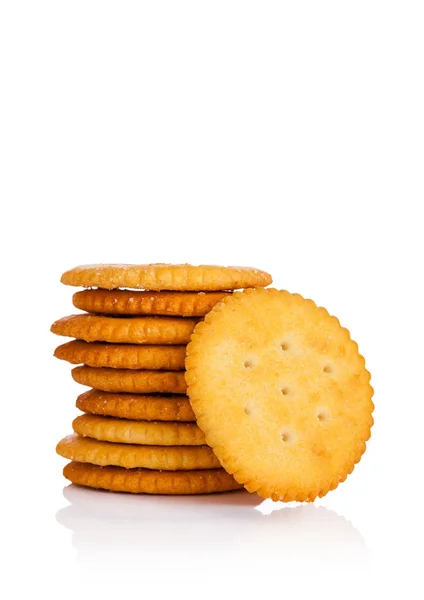 Round cheese crackers with salt on white — Stock Photo, Image