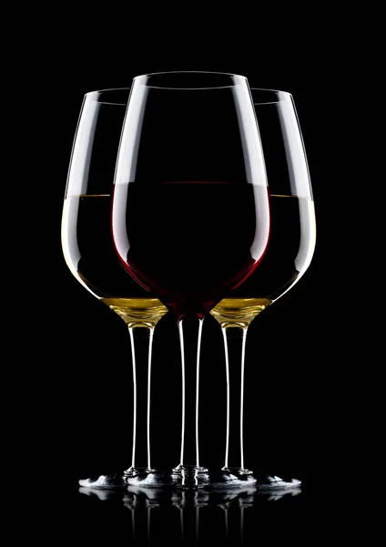 Glasses of red and white wine on black — Stock Photo, Image