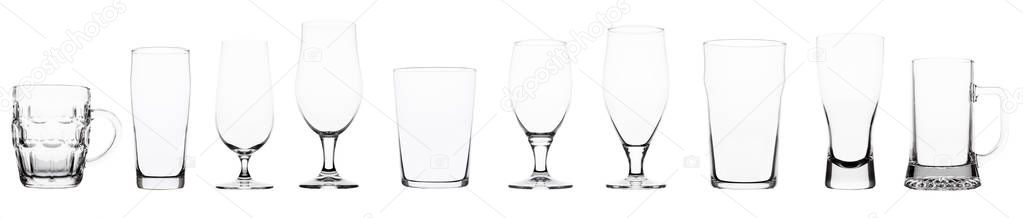 Empty beer glasses on white 