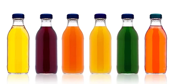 Glass bottles with fresh organic juice on white — Stock Photo, Image