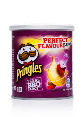 LONDON, UK - November 17, 2017: Pringles potato chips barbeque in mini tube on white. Potato and wheat-based stackable snack chips owned by the Kellogg Company. clipart