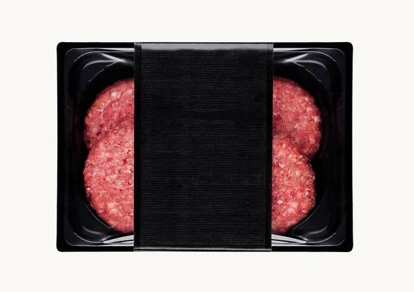 Hambúrgueres crus de carne fresca em bandeja de plástico — Fotografia de Stock