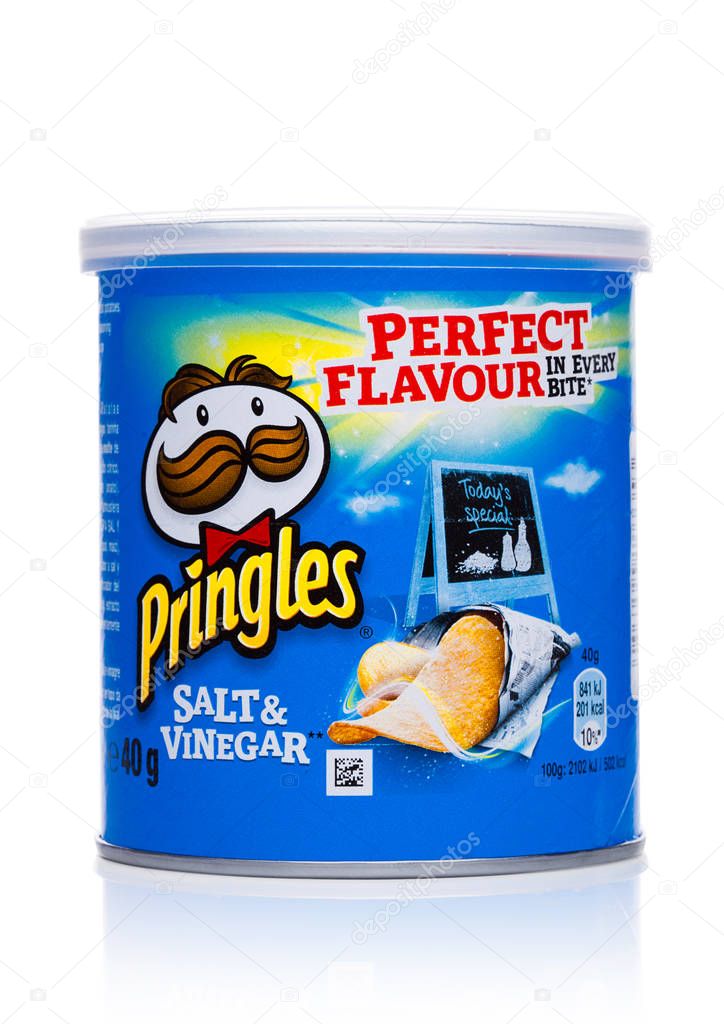 LONDON, UK - November 17, 2017: Pringles potato chips vinegar in mini tube on white background. Potato and wheat-based stackable snack chips owned by the Kellogg Company.