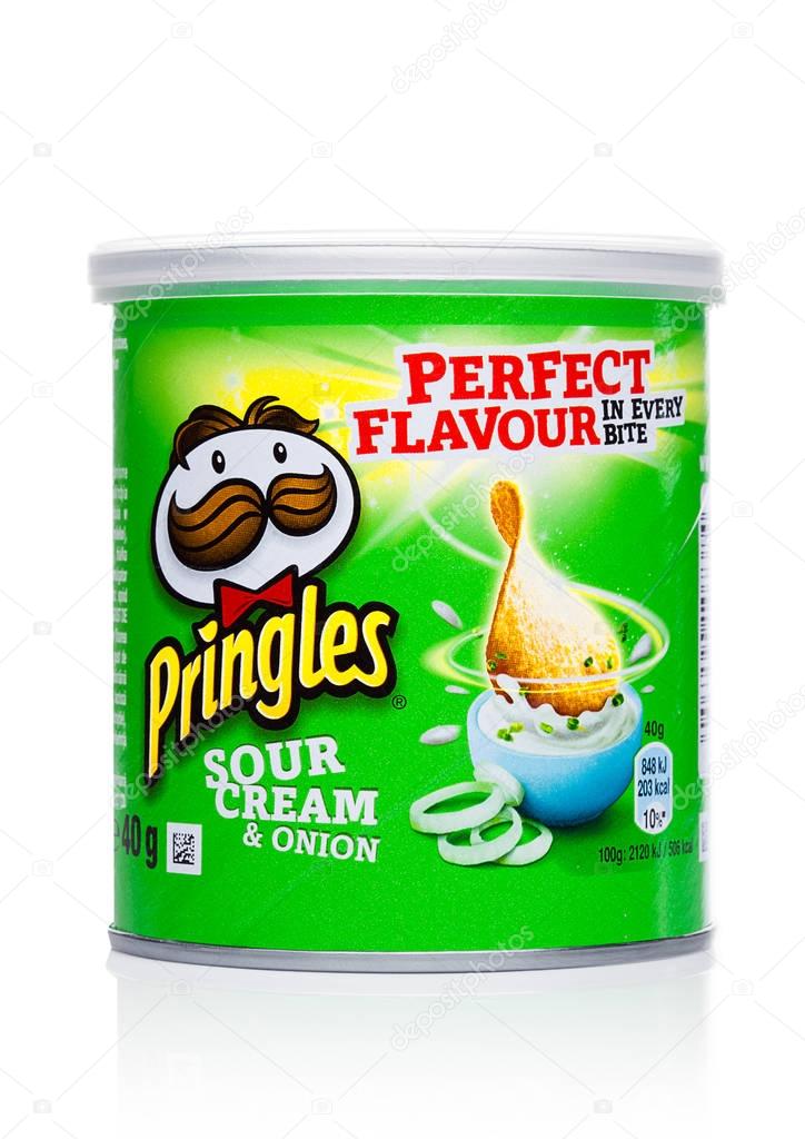 LONDON, UK - November 17, 2017: Pringles potato chips sour cream in mini tube on white background. Potato and wheat-based stackable snack chips owned by the Kellogg Company.