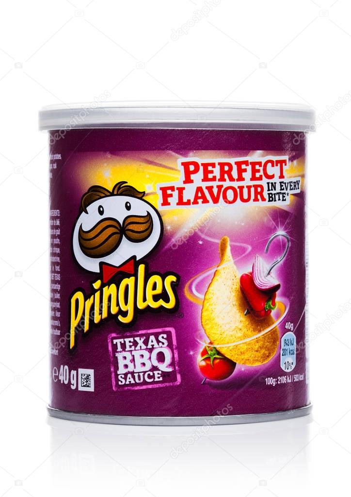 LONDON, UK - November 17, 2017: Pringles potato chips barbque in mini tube on white background. Potato and wheat-based stackable snack chips owned by the Kellogg Company.