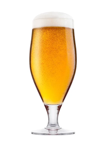 Cold glass of lager beer with foam and dew — Stock Photo, Image