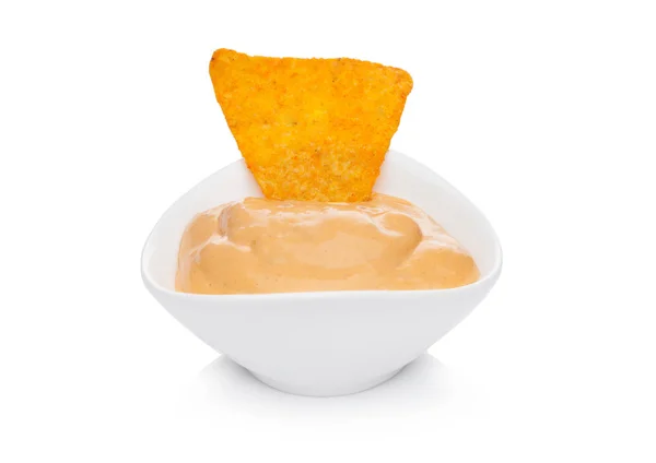 Glass container with cheese dip and nachos chips — Stock Photo, Image