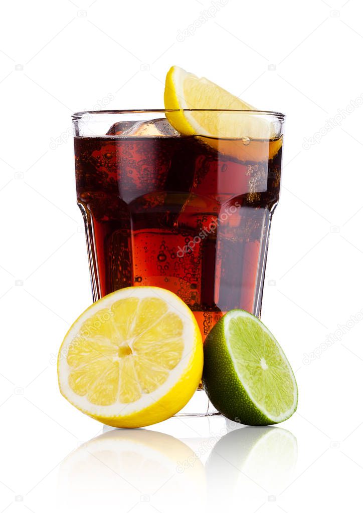 Glass of cold cola soda drink with lime and lemon