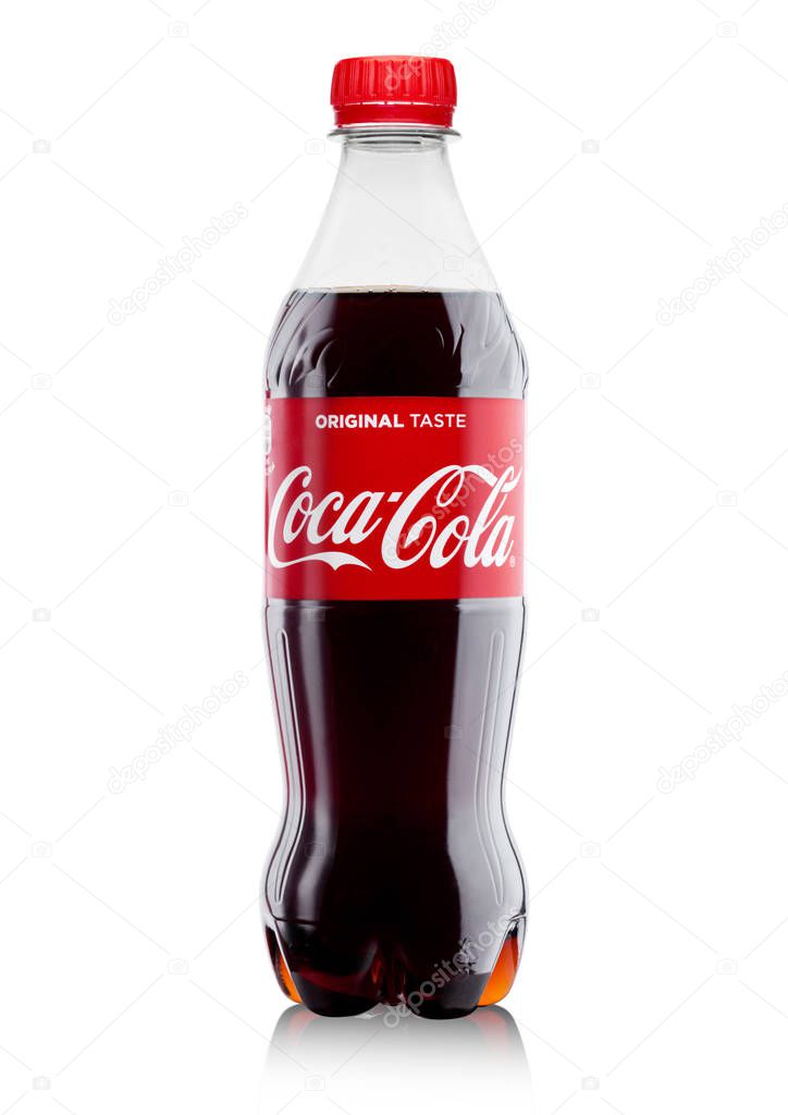 LONDON, UK -DECEMBER 07, 2017: Bottle of Classic Coca-Cola on white Background. Coca-Cola is one of the most popular soda products in the world.