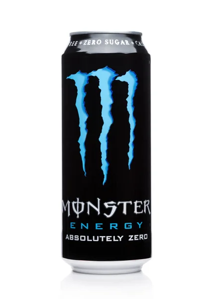 LONDON, UK - DECEMBER 15, 2017: A can of Monster Energy Drink juiced on white. Introduced in 2002 Monster now has over 30 different drinks with high a caffeine content. — Stock Photo, Image