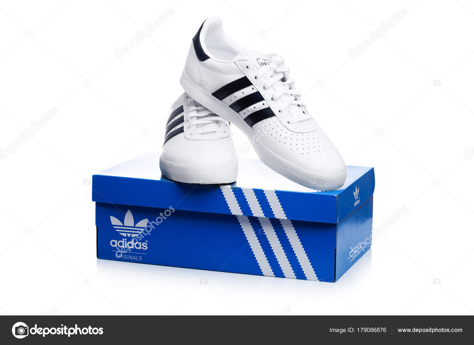 LONDON, UK - JANUARY 02, 2018: Adidas Originals shoes on of blue box. – Stock Editorial Photo © DenisMArt #179086876
