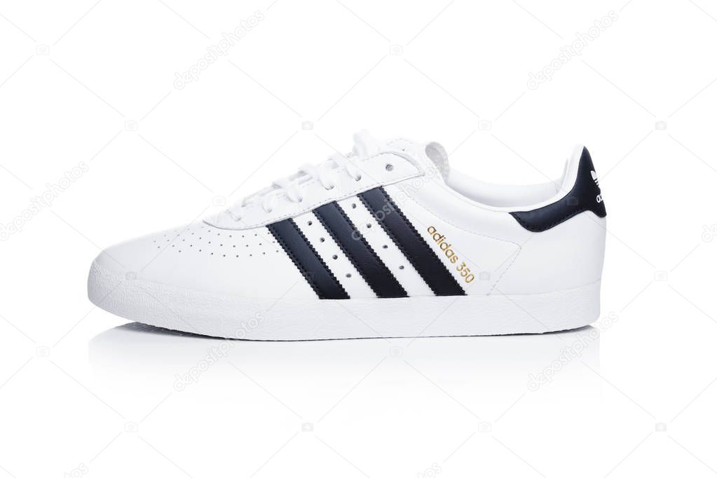 LONDON, UK - JANUARY 02, 2018: Adidas Originals shoes on white background. German multinational corporation that designs and manufactures sports shoes, clothing and accessories.