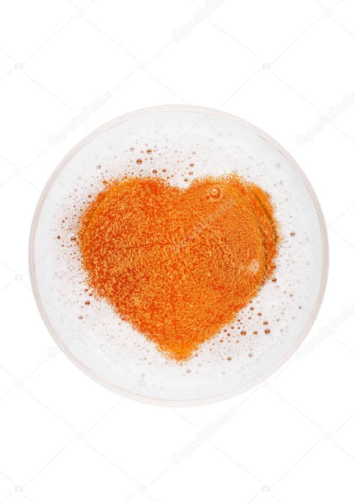 Glass of lager ale beer top with heart shape
