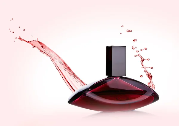 Flacon de parfum liquide rose de luxe avec éclaboussures — Photo