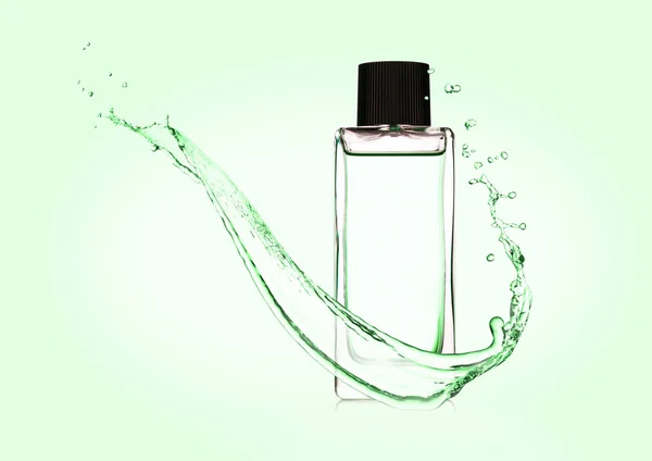 Luxury green liquid perfume bottle with splashes — Stock Photo, Image