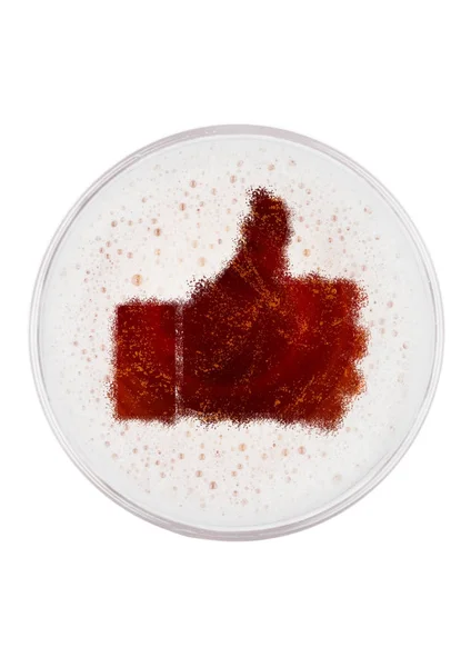Glass of red ale beer top with like symbol shape — Stock Photo, Image