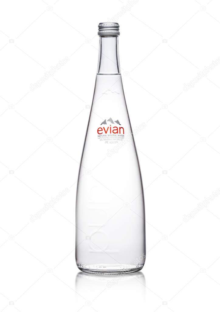 LONDON, UK - JANUARY 10, 2018:  Glass bottle of Pure Evian Natural Mineral Water on a white background. Made in France.