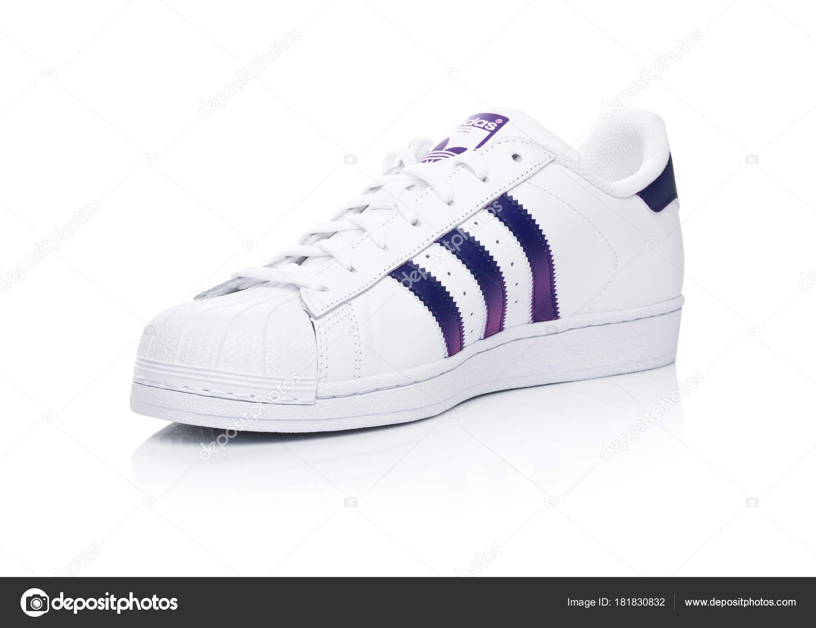 LONDON, UK - 24, 2018: Adidas Originals Superstar blue shoes white.German multinational corporation that designs and manufactures sports shoes, clothing and accessories. – Stock Editorial Photo DenisMArt #181830832