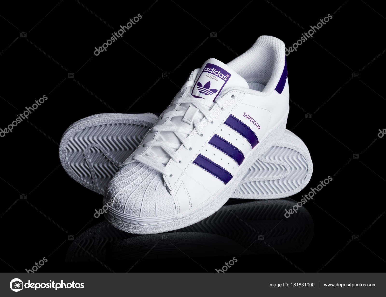 retning Arab afskaffet LONDON, UK - JANUARY 24, 2018: Adidas Originals Superstar blueshoes on  black.German multinational corporation that designs and manufactures sports  shoes, clothing and accessories. – Stock Editorial Photo © DenisMArt  #181831000