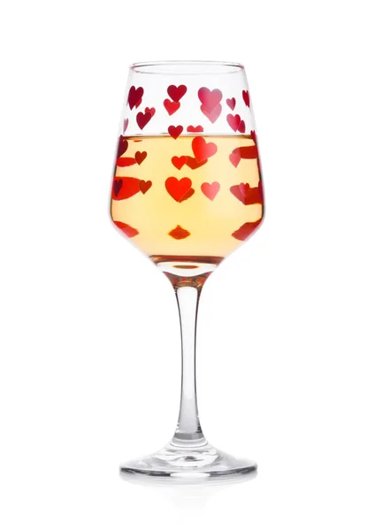Copa de vino blanco con forma de corazón rojo y rosa — Foto de Stock