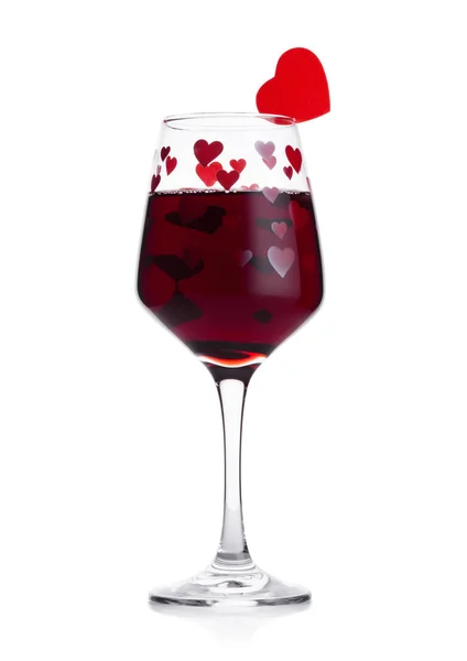 Copa de vino tinto con forma de corazón rojo y rosa — Foto de Stock