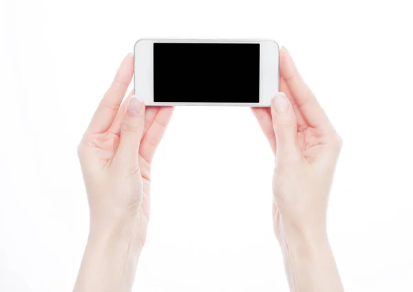 Female hands holding smartphone isolated on white — Stock Photo, Image