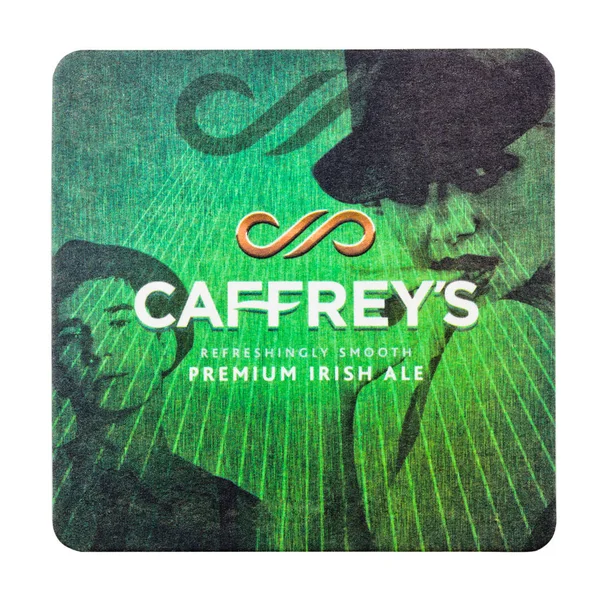 LONDRES, Reino Unido - FEVEREIRO 04, 2018: Caffrey 's irish ale original beermat coaster isolated on white . — Fotografia de Stock