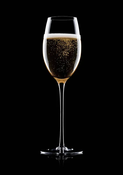 Elegant glass of yellow champagne with bubbles — Stock Photo, Image