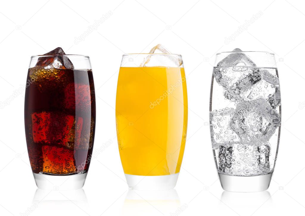 Glasses of cola and orange soda drink and lemonade