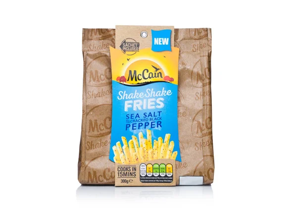 LONDON, UK - FEBRUARY 14, 2018: Pack of McCain Shake Shake Fries with sea salt on white. — Stock Photo, Image