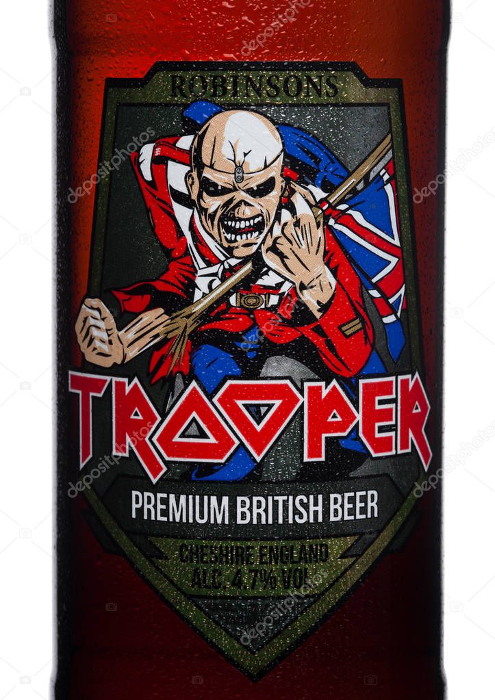 LONDON, UK - FEBRUARY 14, 2018: Cold Bottle label of Trooper Premium British Beer on white background. Created by Iron Maiden.