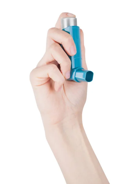 Hand holds blue asthma inhaler for relief asthma — Stock Photo, Image