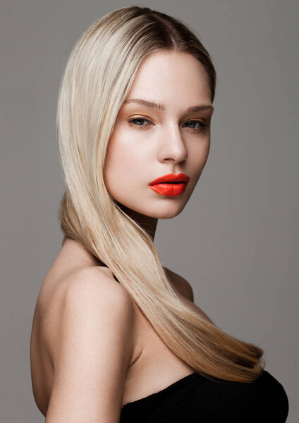 Beauty portrait model with shiny blonde hairstyle