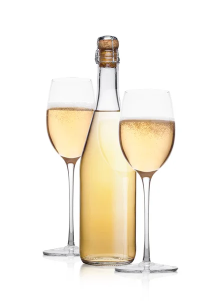 Bottle and glass of yellow champagne with bubbles — Stock Photo, Image