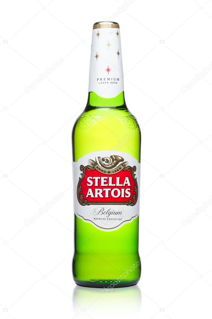 LONDON, UK -MARCH 22, 2018: Cold Bottle of Stella Artois beer on white background, prominent brand of Anheuser-Busch InBev, is a pilsner brewed in Leuven, Belgium, since 1926.