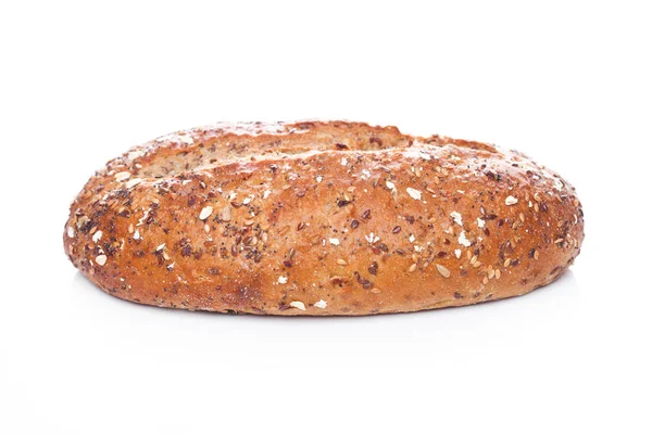 Freshly baked  loaf of bread with oats on white — Stock Photo, Image