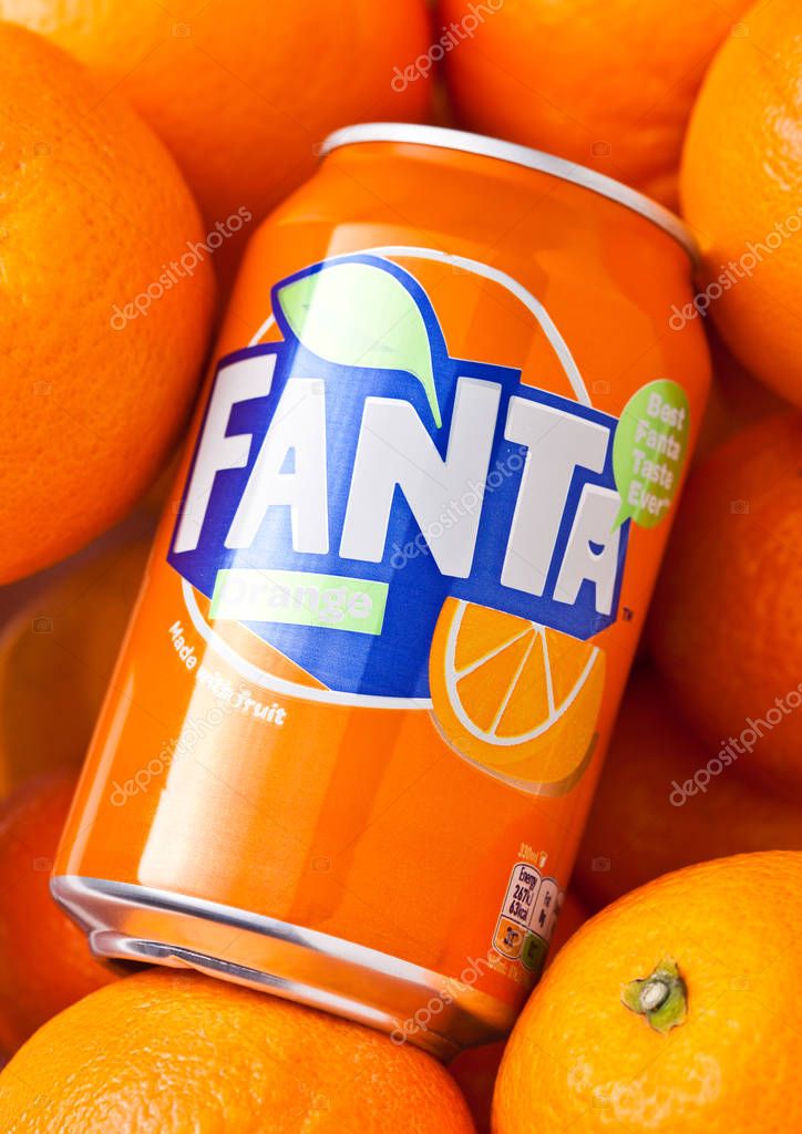 LONDON, UK - MARCH 31, 2018: Aluminium tin of Fanta orange soft drink on oranges background