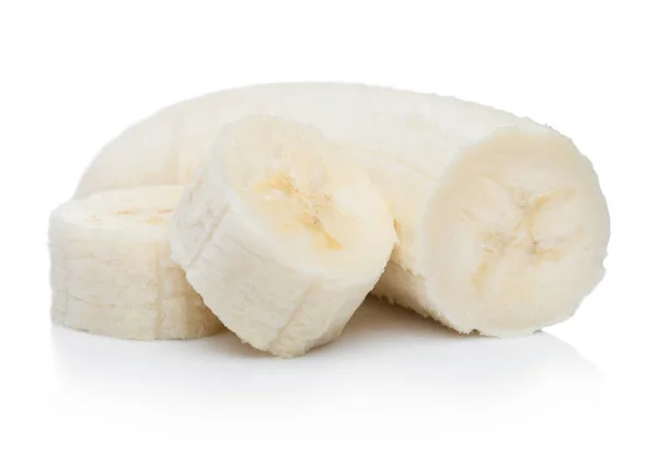 Fresh ripe organic banana sliced pieces on white background with reflection. — Stock Photo, Image