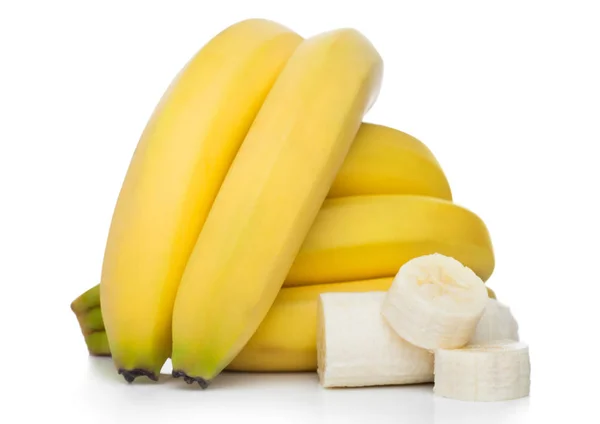 Fresh ripe organic bananas cluster with sliced pieces on white background. — Stock Photo, Image