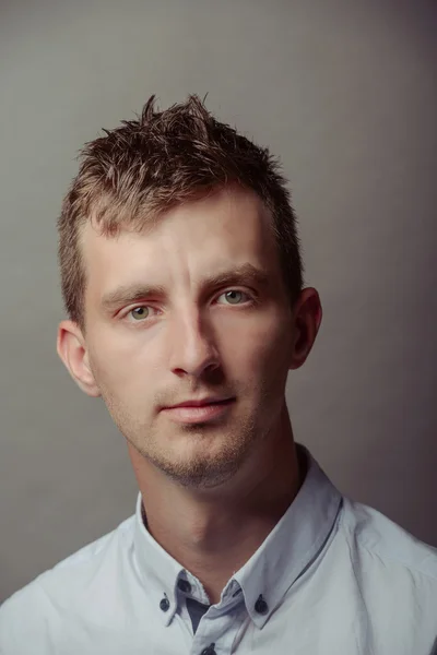 Portrait of a smart serious young man — Stock Photo, Image