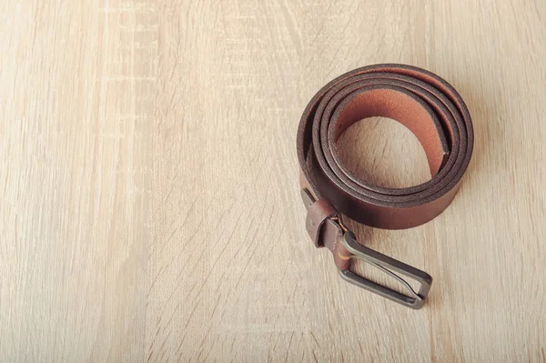 Leather belt in spring — Stock Photo, Image