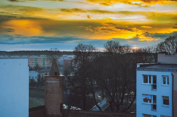 Západ slunce nad městem — Stock fotografie