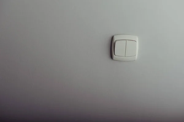 Interruptor de luz de plástico blanco — Foto de Stock