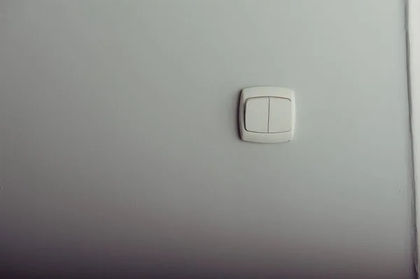 Interruptor de luz de plástico blanco — Foto de Stock