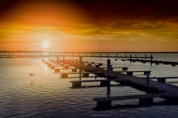 Yacht port over orange sunset — Stock Photo, Image