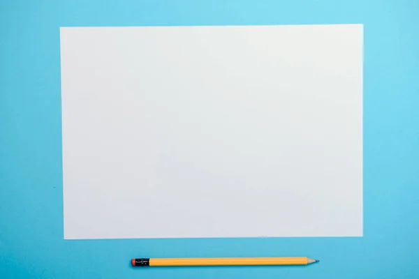 Blank paper and yellow pencils Stock Image