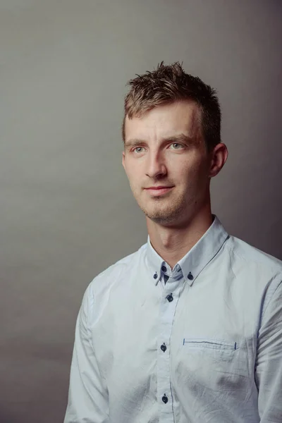 Portrait of a smart serious young man — Stock Photo, Image