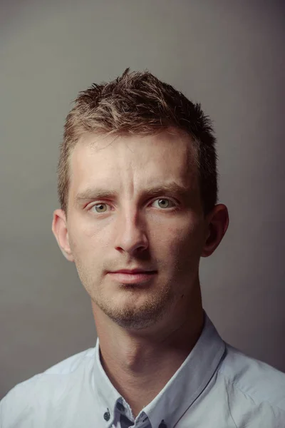 Portrait of a smart serious young man — Stock Photo, Image