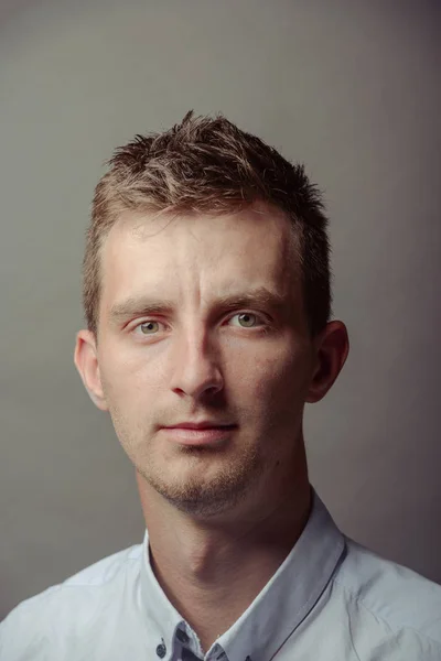 Portrait of a smart serious young man — Stock Photo, Image