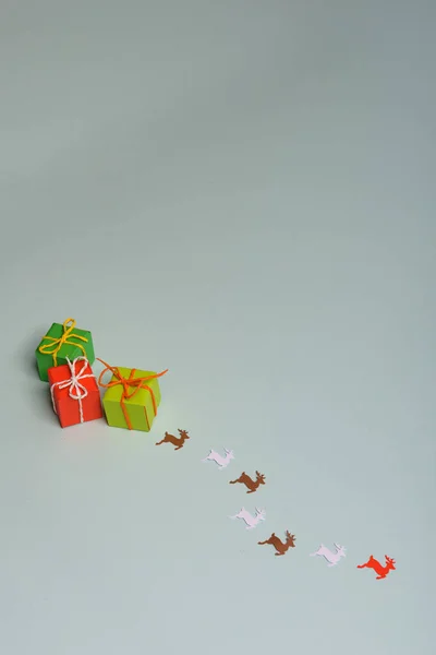 Christmas presents nicely decorated with bows and feathers. view from above. Reindeers Stock Image